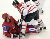 Russia's Alexander Semin (28) and Canada's Dan Boyle (22) have words during the third period of a men's quarterfinal round ice hockey game at the Vancouver 2010 Olympics in Vancouver, British Columbia, Wednesday, Feb. 24, 2010. (AP Photo/Jae C. Hong)
